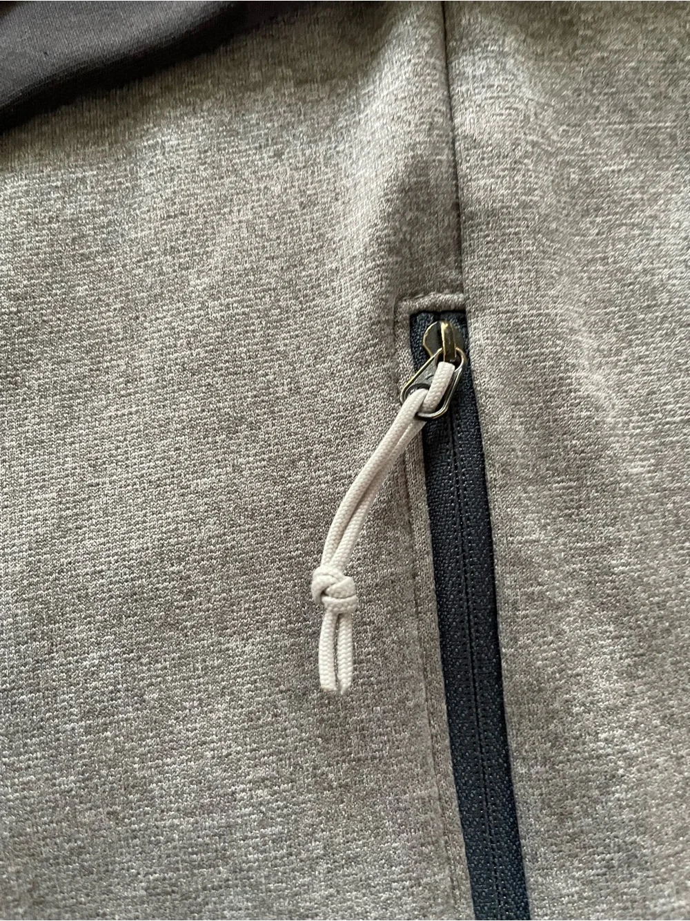 The North Face Men's Hooded Lightweight Jacket in Light Gray with Orange Accents